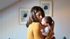 Mother holding her child