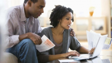 Couple examining medical bills