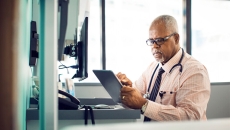 Doctor looking at screen