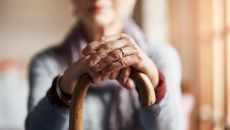 Senior woman with cane