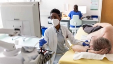 Cardiologist doing an echocardiogram