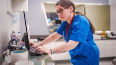 Healthcare worker on computer