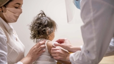 Toddler receiving a vaccine