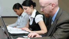 Three people working
