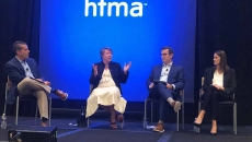 OSF HealthCare CFO Michael Allen, Henry Ford Health Executive VP and CFO Robin Damschroder and Jana Cook, senior VP and CFO for Phelps Health, take questions from moderator Norman Mosrie of Forvis at the HFMA annual conference.