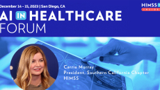 Carrie Murray at HIMSS Southern California chapter_Doctor looking at brain scan on tablet photo by katleho Seisa/Getty Images