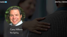 Casey Williams, RevSpring_Doctor utting and on patient's shoulder Photo by Bevan Goldswain/E+/Getty Images