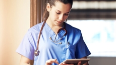 Healthcare worker with tablet