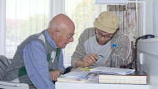 Two people going over paperwork