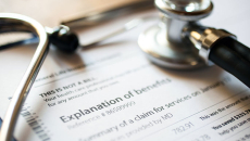 Stethoscope on Explination of Benefits document