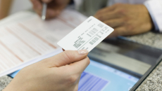 Person presenting insurance card