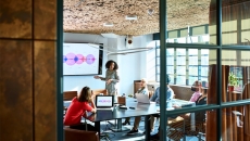 A business presentation in a conference room. Photo: 10,000Hours/Getty Images