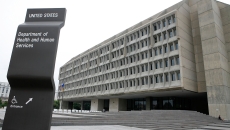 U.S. HHS building with placard