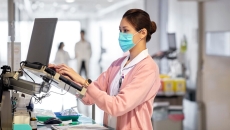 healthcare professional reading reports