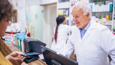Pharmacist helps a customer