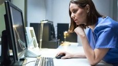 Clinician on computer