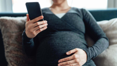 Pregnant woman on phone