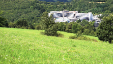 Hospital surrounded by fields and forests