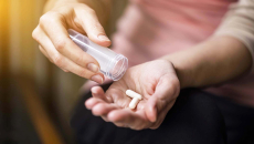 Person taking pills