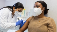 A vaccination. Photo: Luis Alvarez/Getty Images