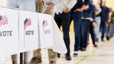 Voters stand in line