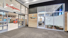 A VillageMD entrance next to a Walgreens entrance