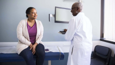 Doctor with patient