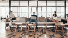 Office with people wearing masks. Photo: Orbon Alija/Getty Images