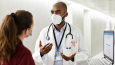 A patient and medical professional talk