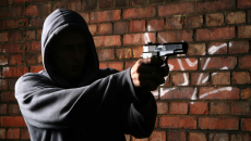 Person pointing a gun