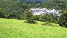Hospital set in fields and hills