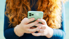 Person holds smartphone