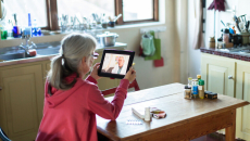 A telehealth visit via tablet. Photo: Alistair Berg/Getty Images