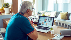 doctor and patient consultation over laptop