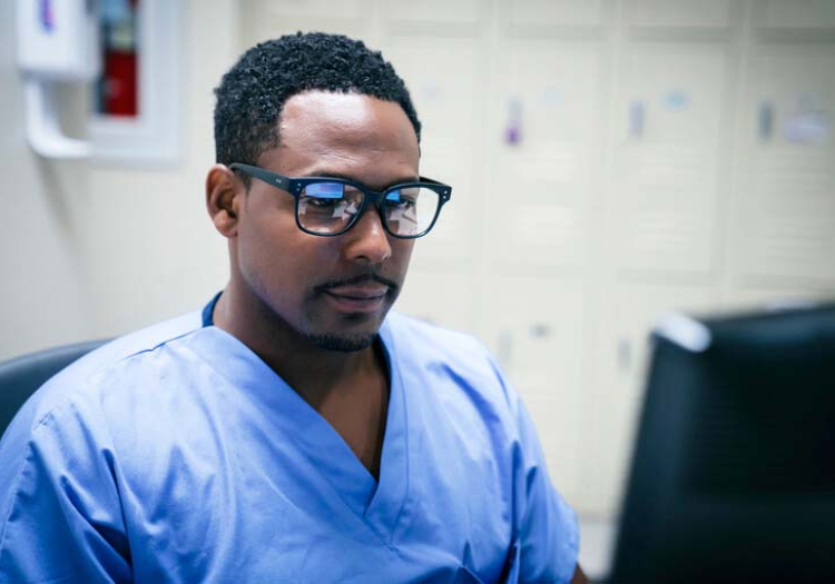 Clinician at computer