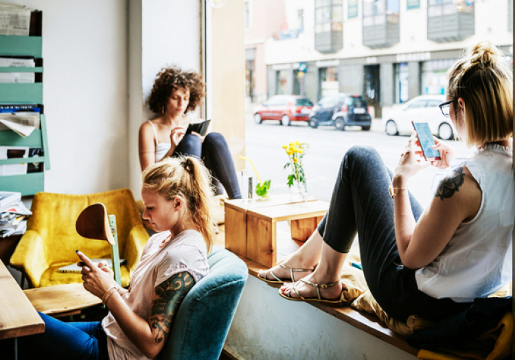 People on phones together