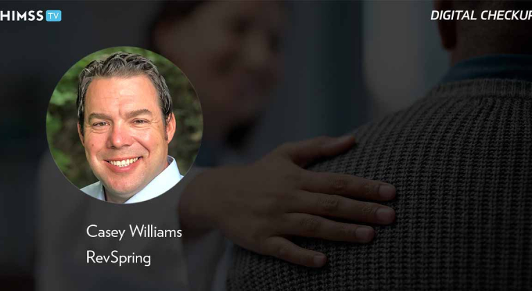 Casey Williams, RevSpring_Doctor utting and on patient's shoulder Photo by Bevan Goldswain/E+/Getty Images