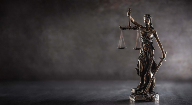 Lady Justice holding her scales
