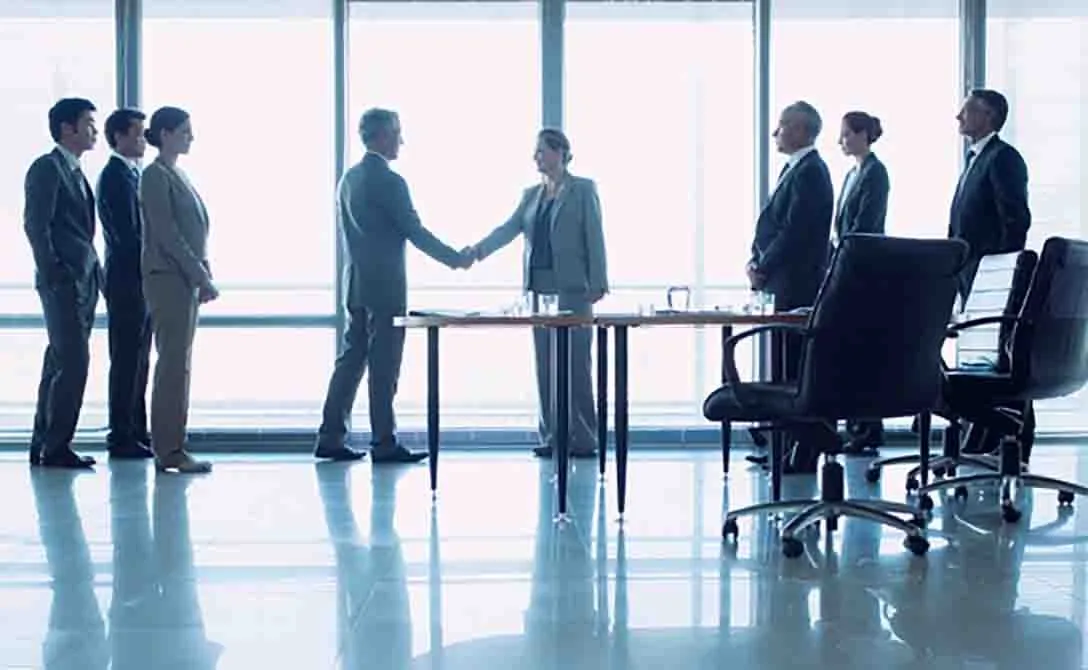 Execs shaking hands Execs shaking hands