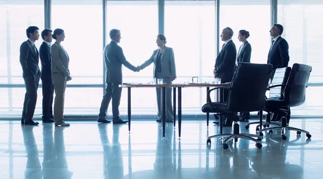 Executives shaking hands Executives shaking hands