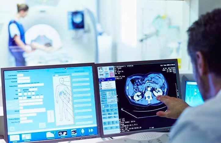 Doctor looking at radiation images Doctor looking at radiation images