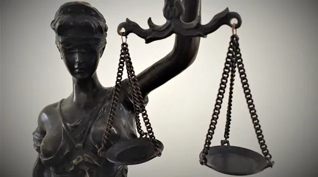 Lady Justice holding her scales
