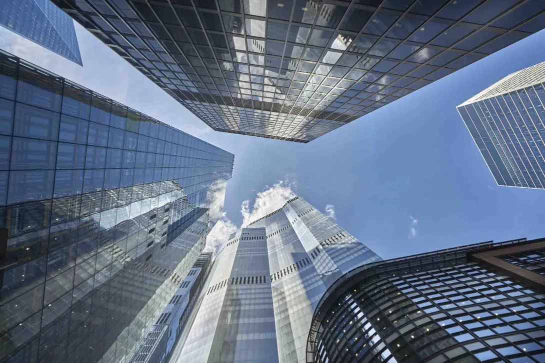 Bottom-up view of a cluster of skyscrapers
