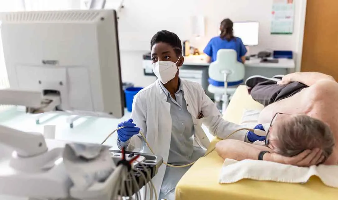 Cardiologist doing an echocardiogram