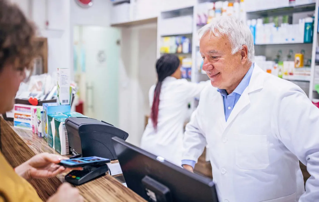 Pharmacist with customer
