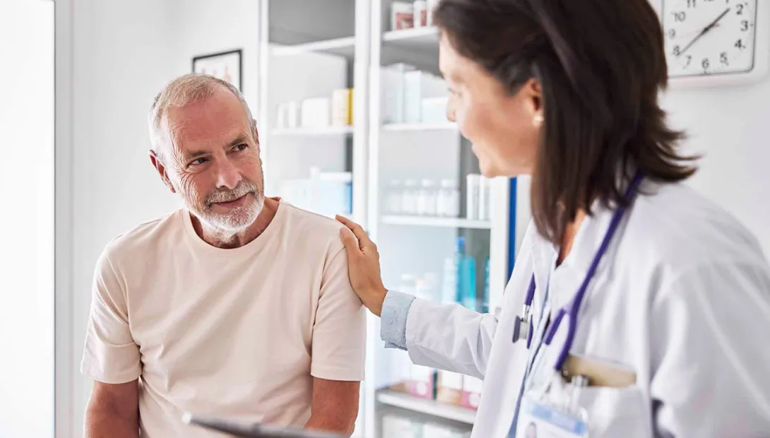 Female doctor with senior patient