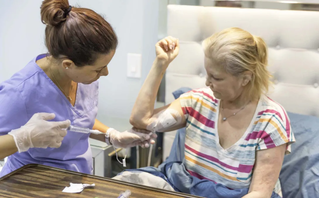 Clinician and patient with an infusion