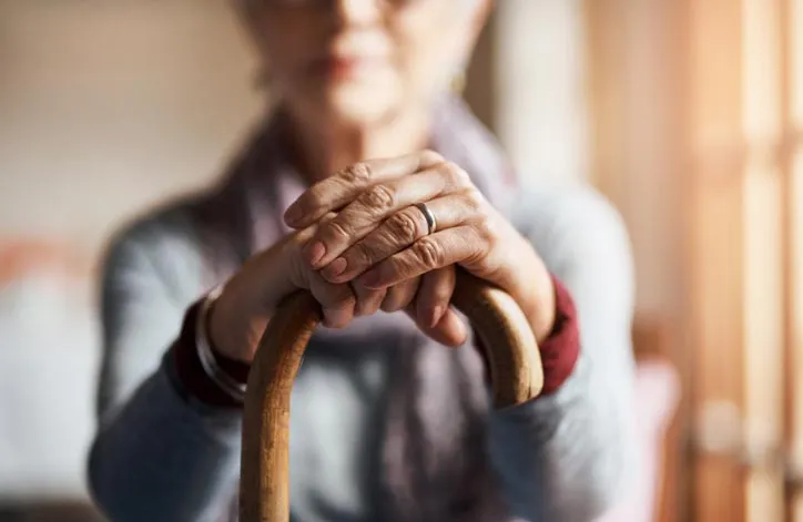Senior adult with cane