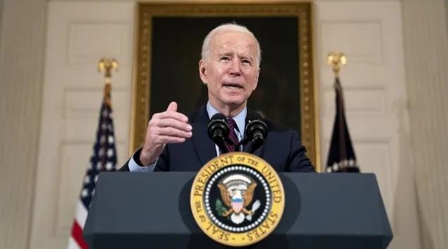 President Biden at podium. Photo: Stefani Reynolds/Getty Images