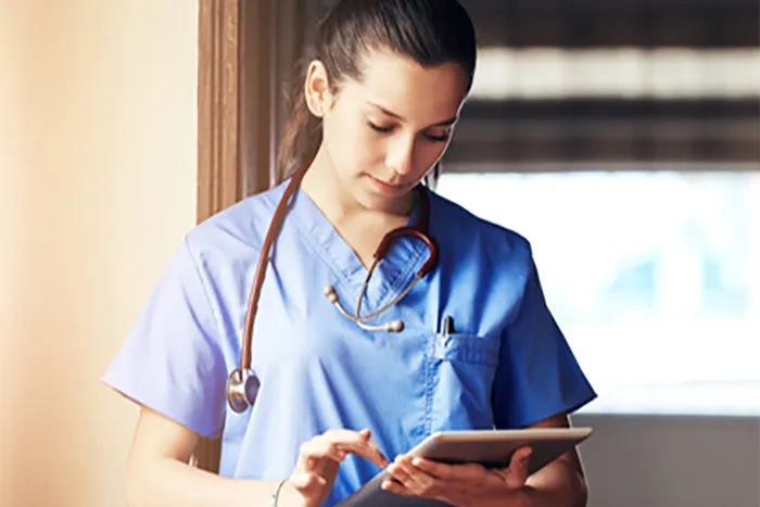 Medical professional with tablet